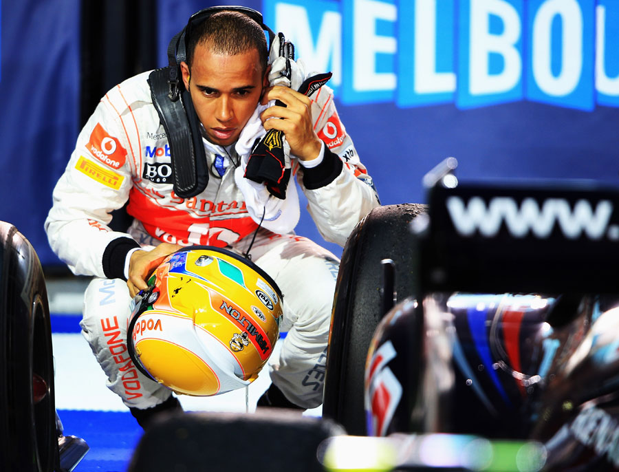 Lewis Hamilton takes a closer look at the race-winning Red Bull