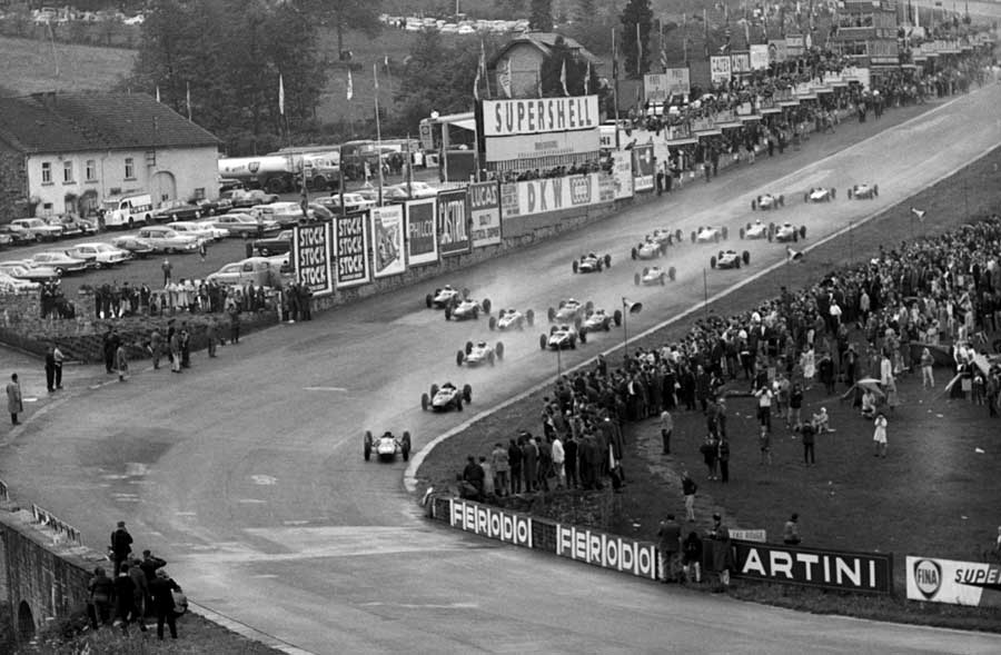 Jim Clark leads the field towards Eau Rouge having started from eighth