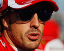 Fernando Alonso talks to the press on the Melbourne grid