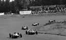 John Surtees (right) puts pressure on race leader Jim Clark