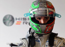Tonio Liuzzi in the HRT garage between sessions