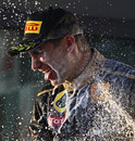 Vitaly Petrov gets a face full of champagne on the Albert Park podium