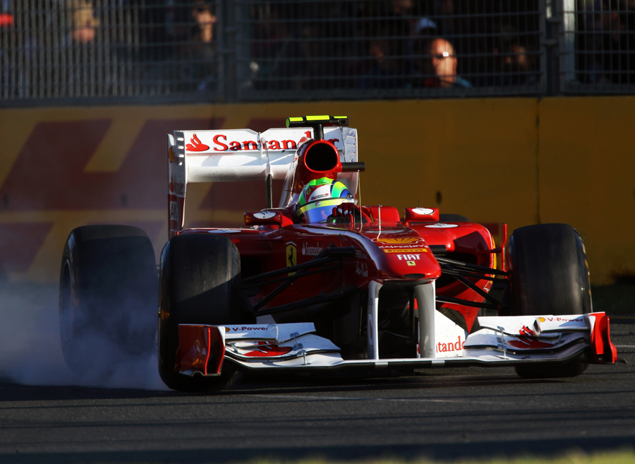 Felipe Massa locks up in the Ferrari
