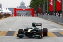 Heikki Kovalainen at the wheel of the Lotus T127 for a demonstration run in Putrajaya ahead of the Malaysian Grand Prix