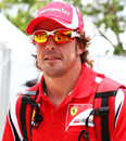 Fernando Alonso arrives in the paddock