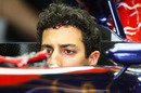 Daniel Ricciardo makes himself comfortable in the Toro Rosso cockpit