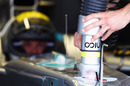 Mechanics pump cold air through Nico Rosberg's cockpit