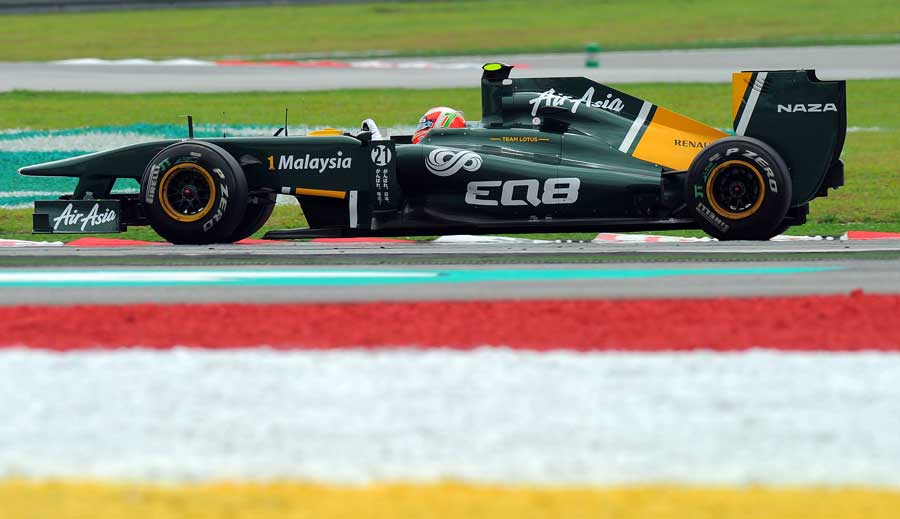 Jarno Trulli turns in the Lotus T128
