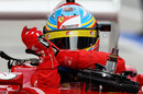 Fernando Alonso gets out of his Ferrari after qualifying fifth
