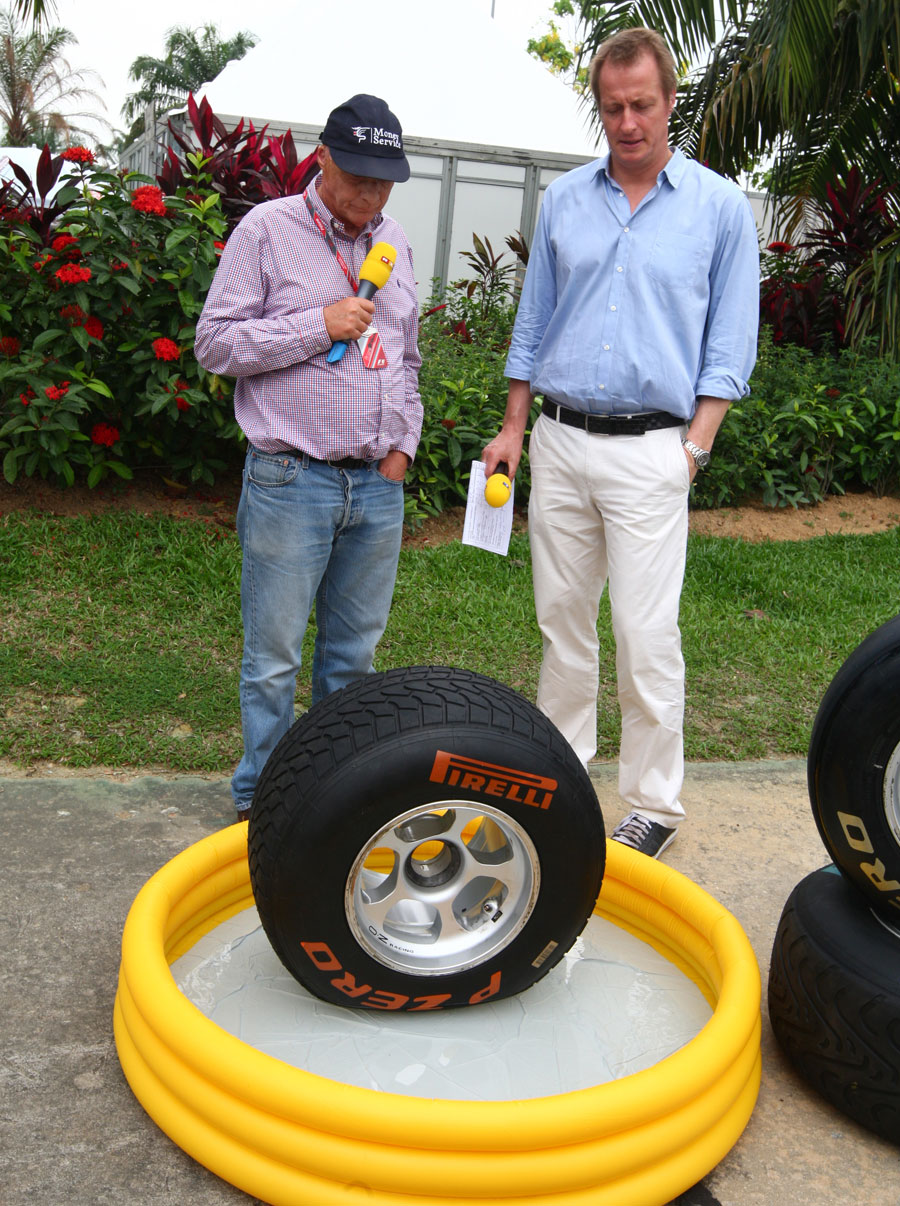 Niki Lauda demonstrates the Pirelli wet tyre for German TV