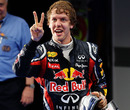 Sebastian Vettel celebrates for the cameras
