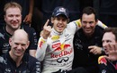 Sebastian Vettel celebrates with the Red Bull team