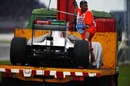 Sergio Perez's car is recovered after he retired