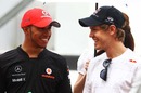 Lewis Hamilton and Sebastian Vettel share a joke