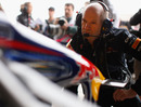 Adrian Newey check over one of Red Bull's cars