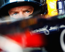 Sebastian Vettel in the cockpit of the Red Bull RB7
