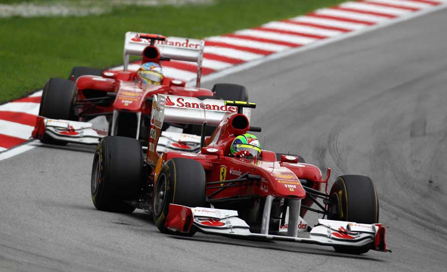 Felipe Massa heads Fernando Alonso