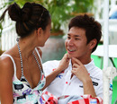 Kamui Kobayashi with his girlfriend Yu Abiru in the paddock