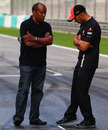 Lewis Hamilton and father Anthony check out his grid spot the night before the race