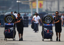 Sebastian Vettel's and Mark Webber's tyre allocations are wheeled through the paddock
