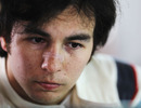 A focused Sergio Perez in the Sauber garage