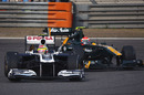 Jarno Trulli puts pressure on Pastor Maldonado