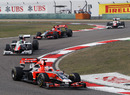 Timo Glock leads the battle of the backmarkers