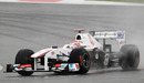 Kamui Kobayashi aims for the apex in the Sauber