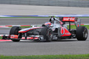 Jenson Button negotiates the final corners of the lap in second practice