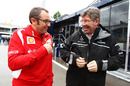 Stefano Domenicali and Ross Brawn share a joke in the paddock