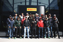 The drivers pose outside the Pirelli motorhome ahead of practice on Saturday