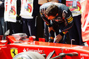 Mark Webber takes a closer look at Fernando Alonso's Ferrari