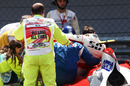 Davide Rigon is lifted out of his car after an accident with Julian Leal