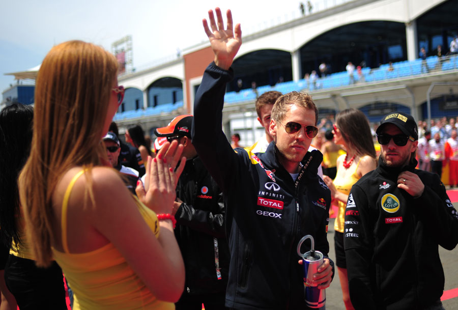Sebastian Vettel heads out for the drivers' parade
