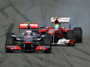 Felipe Massa narrowly avoids an accident with Jenson Button