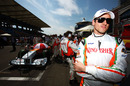 Adrian Sutil waits on the grid