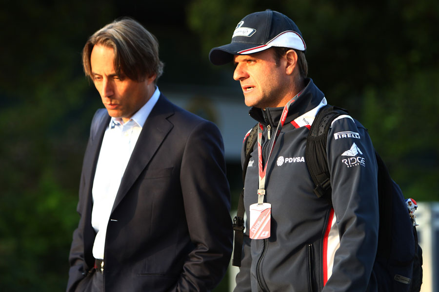 Rubens Barrichello talks to Williams chairman Adam Parr