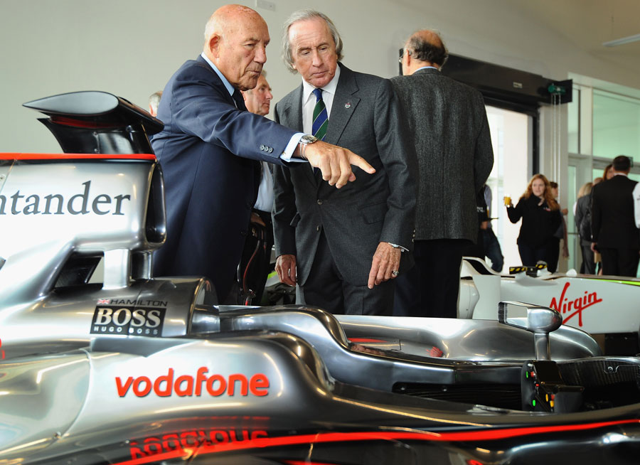 British F1 legends Sir Stirling Moss and Sir Jackie Stewart take a close look at one of Lewis Hamilton's McLarens