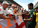 Karun Chandhok signs autographs for fans at the circuit on Thursday